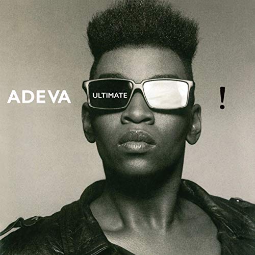 Black-and-white album cover featuring a man with sunglasses and a leather jacket.