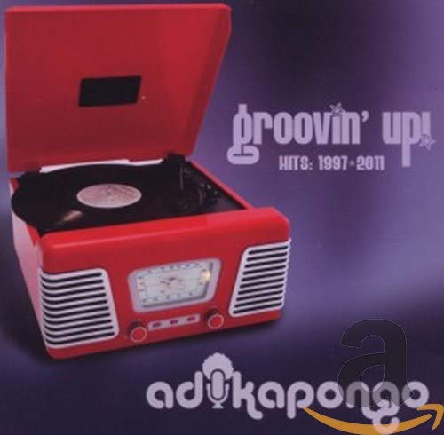 Red record player with album title “Groovin’ Up! Hits: 1997-2011”.
