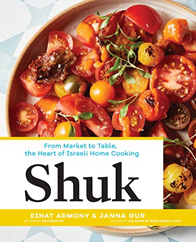 Cookbook "Shuk" cover with roasted tomatoes and vibrant yellow title text.