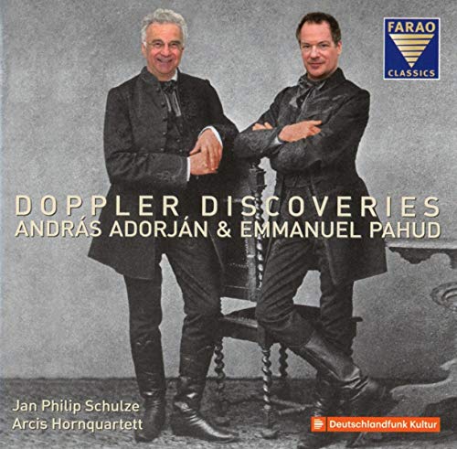 CD cover featuring two men in suits standing by an ornate chair.