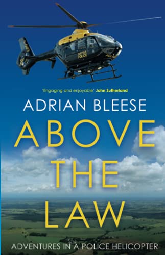 Book cover: police helicopter above clouds, title "Above the Law".
