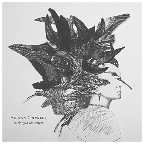 "Black and white vinyl album cover featuring a woman's head with birds on her head."