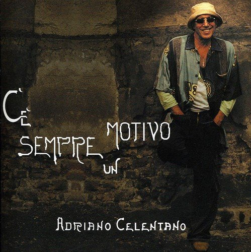 Adriano Celentano album cover with artist in hat against a stone wall.