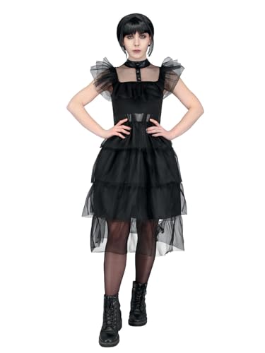 Woman in black, layered gothic-style dress with ruffled sleeves.
