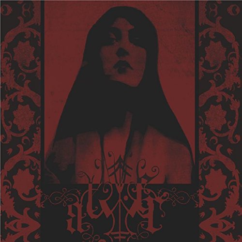 Red album cover featuring a veiled woman’s face and ornate lettering.