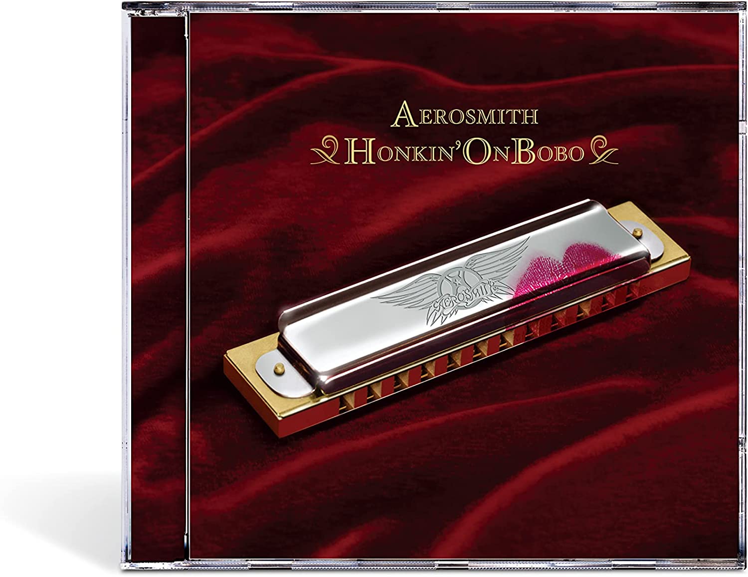Aerosmith “Honkin’ On Bobo” CD cover featuring a harmonica.