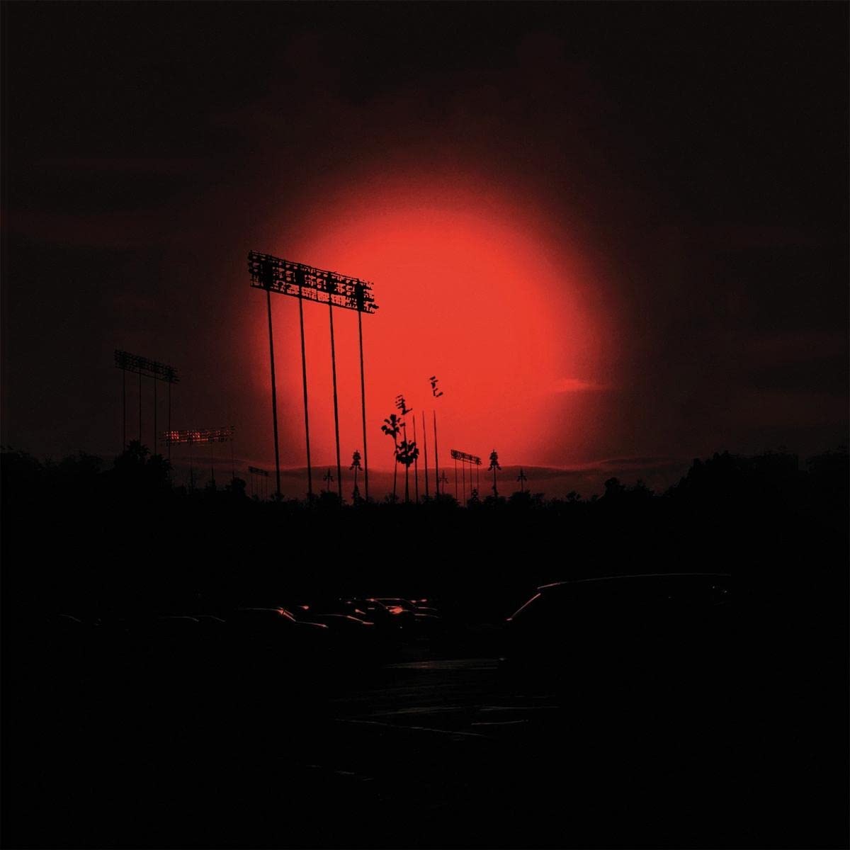 Afghan Whigs CD cover featuring a red-lit stadium at dusk, silhouetted against a dark sky.