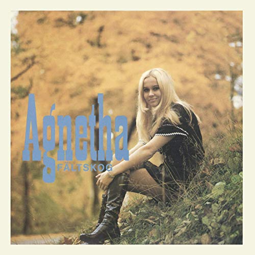 Agnetha Fältskog album cover, blonde woman in boots, outdoor setting.
