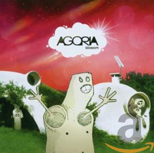 CD cover for Agoria’s “Blossom” featuring a cartoon figure and white buildings.