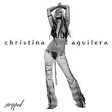 Black and white album cover featuring Christina Aguilera in low-rise jeans.