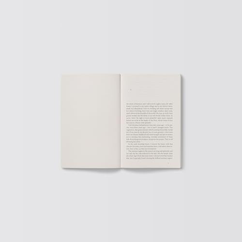 Open book, “Katerina”, with dense text on cream-colored pages.