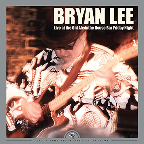 Bryan Lee playing electric guitar live at the Old Absinthe House Bar.