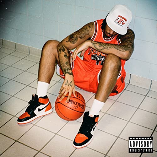 Aj Tracey album cover: man with basketball in a tiled room.