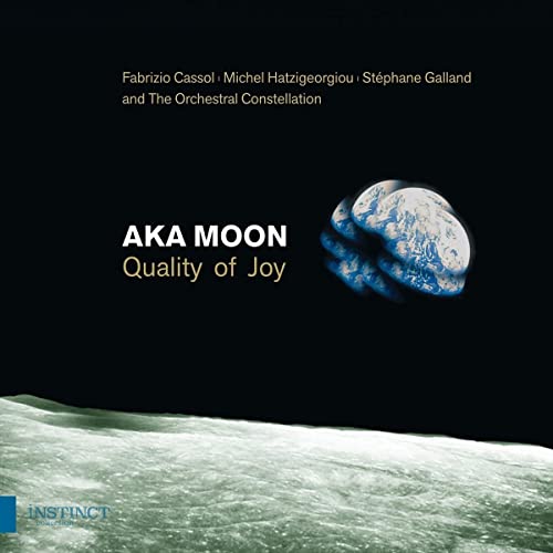 CD cover for “Aka Moon” featuring a stylized Earth-like globe and lunar surface.