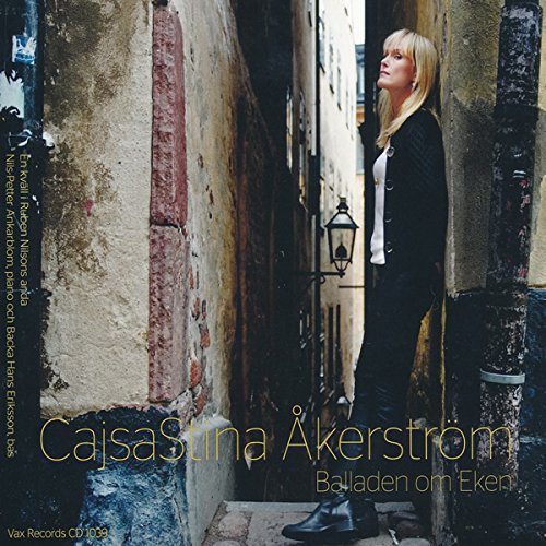 CD cover featuring CajsaStina Åkerström standing in a narrow alleyway.