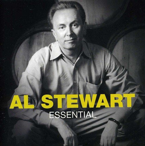 "Music CD cover featuring black and white photo of Al Stewart sitting by barrels."