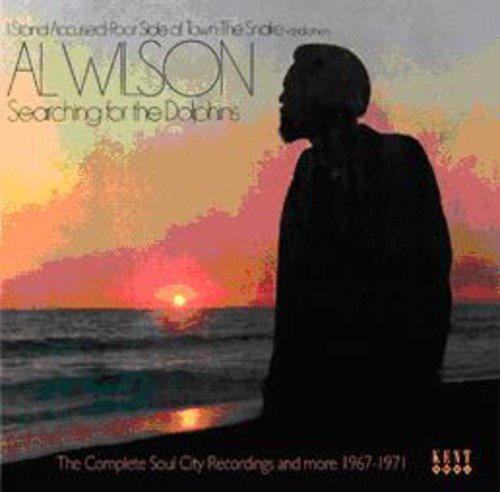 "Album cover featuring a man's silhouette against a sunset over the ocean."