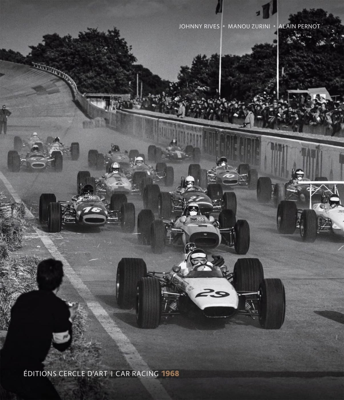 Black and white photo of Formula One race cars competing in 1968.