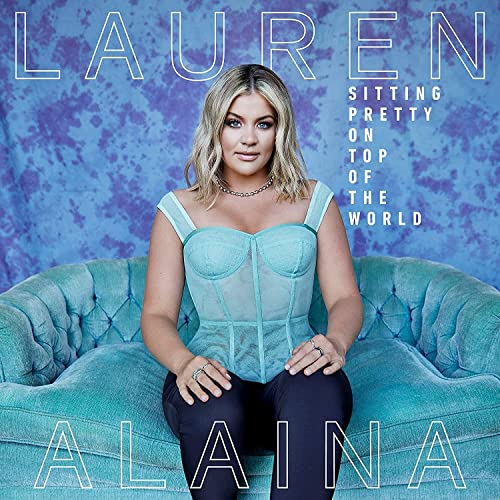 CD cover featuring Lauren Alaina in a blue dress, sitting on a couch.