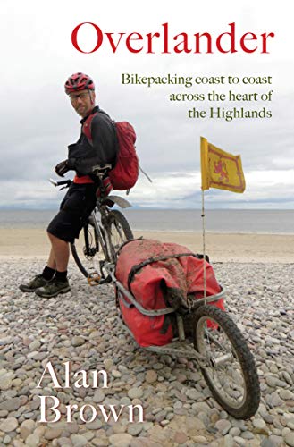 Book cover: cyclist with loaded bike on a pebble beach.