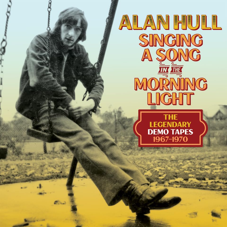 Alan Hull album cover: a man on a swing in a field, yellow background.