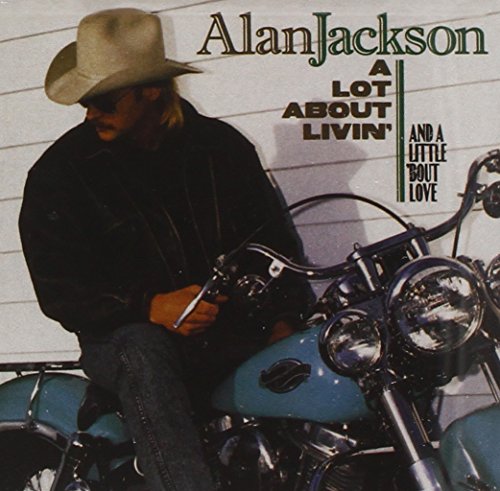 Alan Jackson album cover featuring a man with a motorcycle.