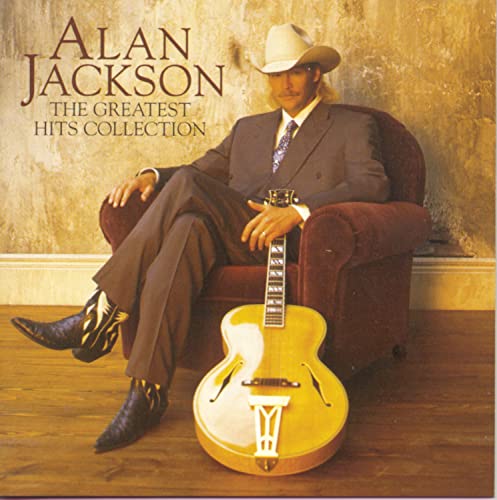 Alan Jackson album cover featuring the artist with a guitar.