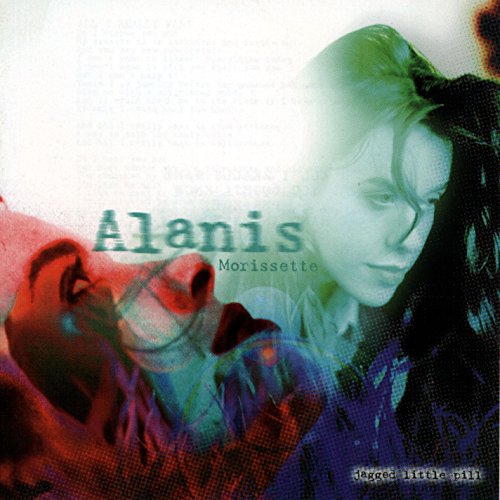Vinyl record with cover featuring Alanis Morissette's face and multicolored abstract design.