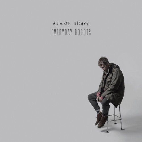 Album cover for Damon Albarn’s “Everyday Robots” featuring a seated man.