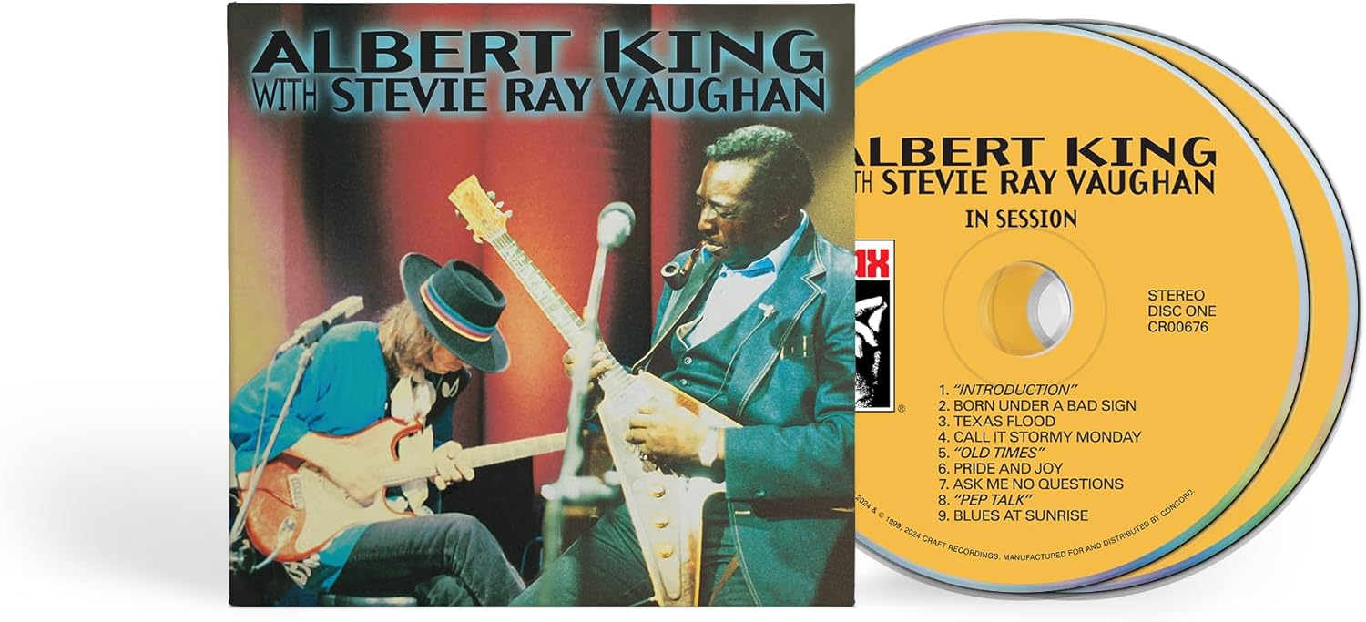 Album cover featuring Albert King and Stevie Ray Vaughan playing guitars with vinyl records.