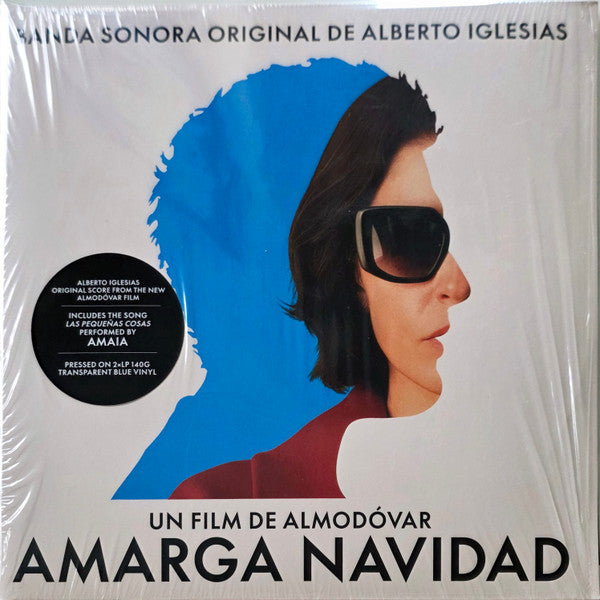Vinyl record cover for "Amarga Navidad" featuring a portrait of a woman.