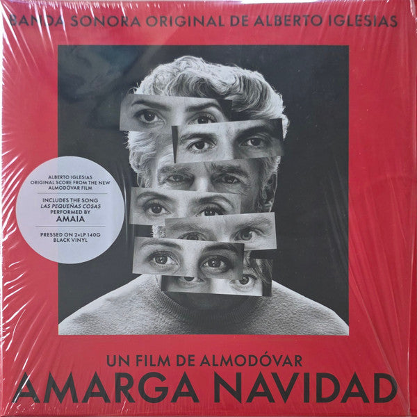 Vinyl record cover for "Amarga Navidad" featuring a fragmented portrait.