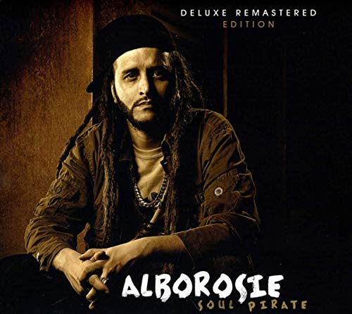 Album cover featuring Alborosie with dreadlocks, a black hat, and a gold chain.