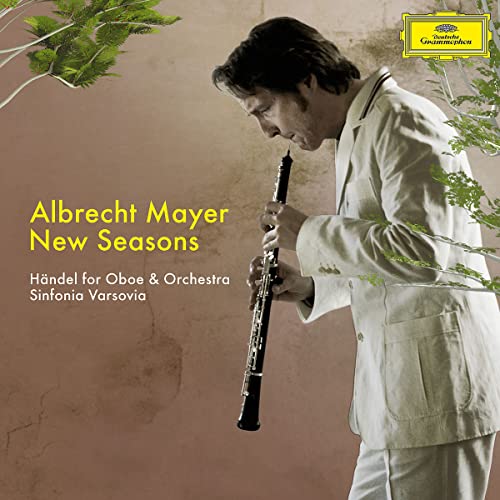 Albrecht Mayer playing the oboe, album cover for “New Seasons.”