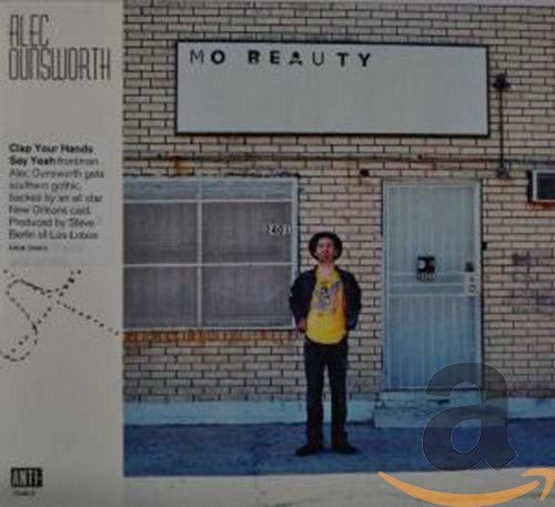 Alec Ounsworth album cover: man standing before a building exterior.