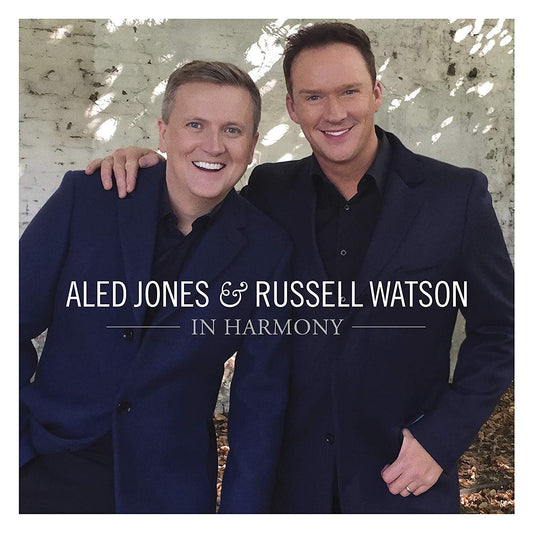 "Album cover featuring Aled Jones and Russell Watson in dark suits, posing together."
