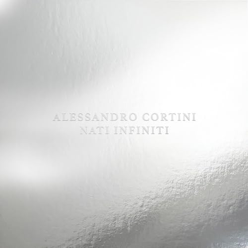 Silver vinyl record cover with artist name "Alessandro Cortini" and title.