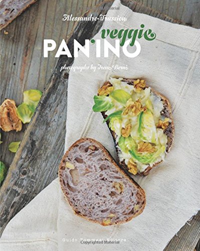 Cookbook cover featuring a halved panino with brussels sprouts and walnuts.
