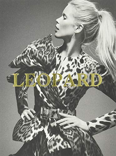 Black and white portrait of a woman in a leopard print coat.