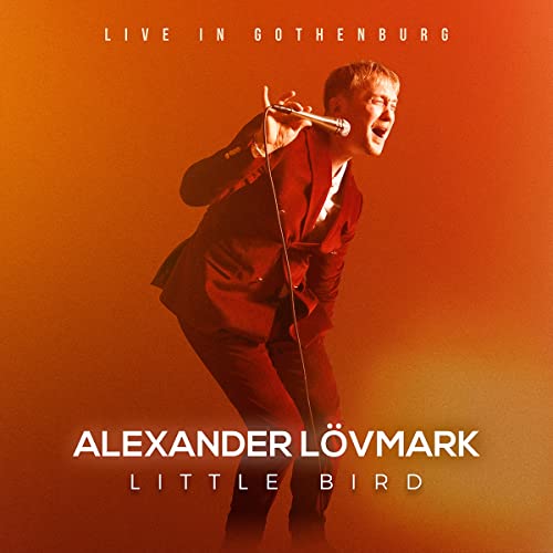 CD cover: Singer Alexander Lövmark in red suit, performing live.