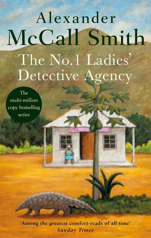 Book cover with a small building, a pangolin, and text by Alexander McCall Smith.