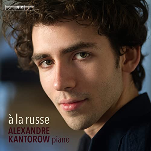 Close-up portrait of Alexandre Kantorow, a pianist, with album title text.