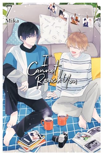 Manga volume cover with two young men sitting on a couch.