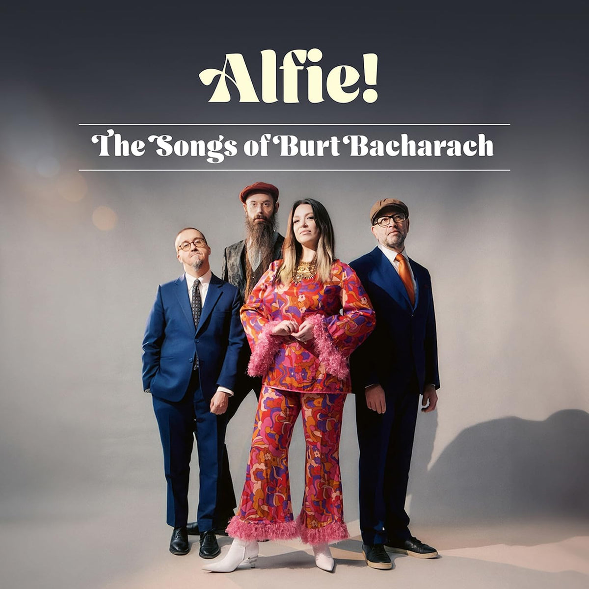 CD cover featuring a group of four people in formal attire.