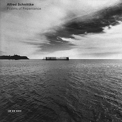 Black and white CD cover with seascape and distant structures.