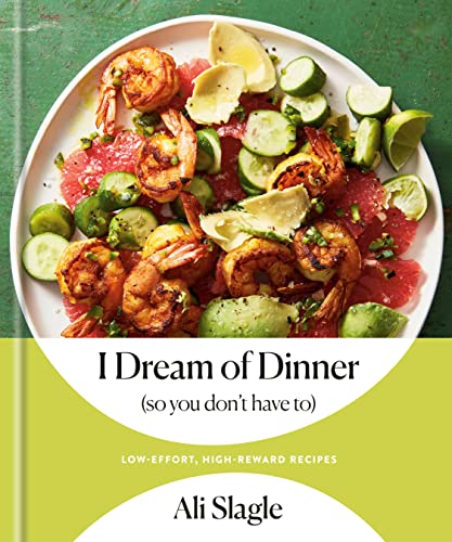 Cookbook cover featuring a plate of shrimp, avocado, cucumber, and grapefruit salad.