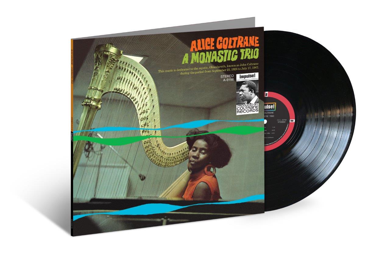 Alice Coltrane vinyl record with album cover featuring a harpist.