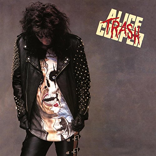 Alice Cooper wearing a studded leather jacket and skull shirt on the Trash album cover.
