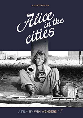 Black and white film poster featuring a man sitting on concrete debris.