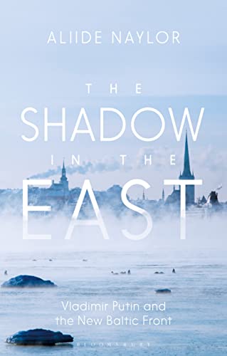 Book cover with misty cityscape and title “The Shadow in the East.”